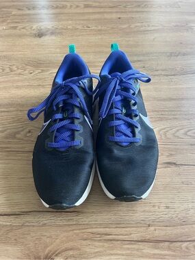 Nike Black Athletic Sneakers with Blue Accents
